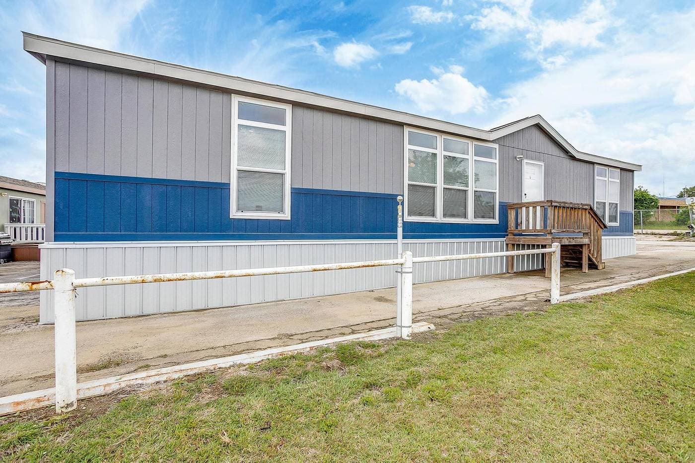 New Moon 3256H Double Wide by Champion photo 1